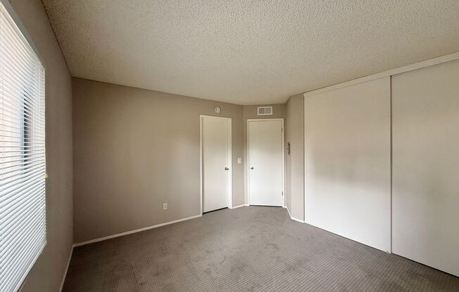 Experience the Charm of This Beautifully Updated Corner Condo
