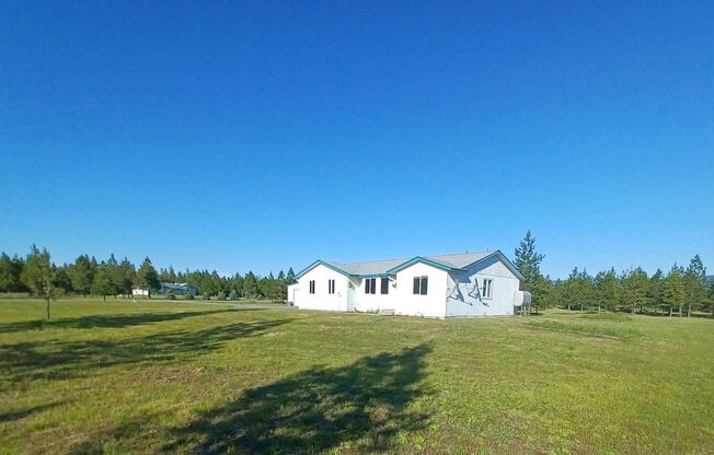 2 bedroom home with Shop and Acreage