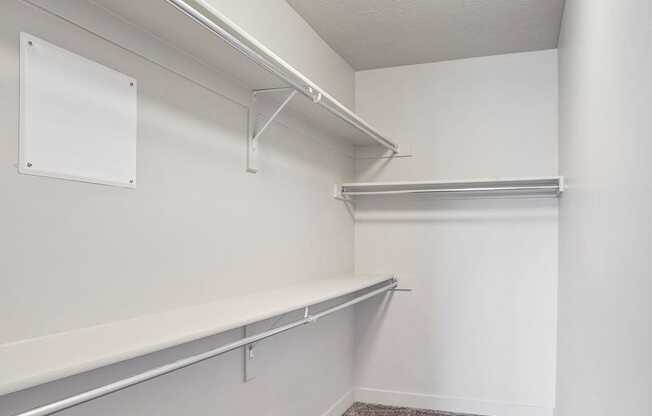 a spacious walk in closet in a 555 waverly unit