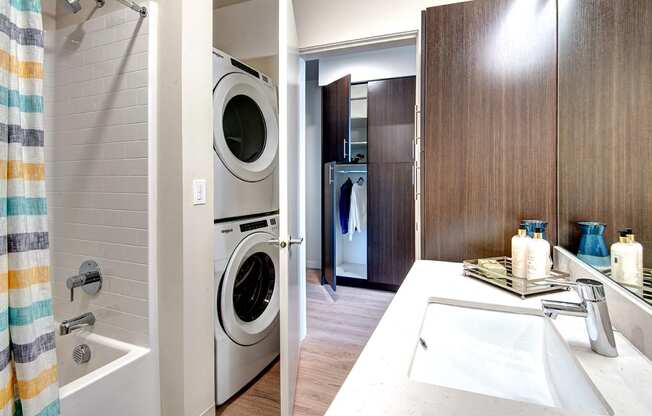 full size washer and dryer in bathroom