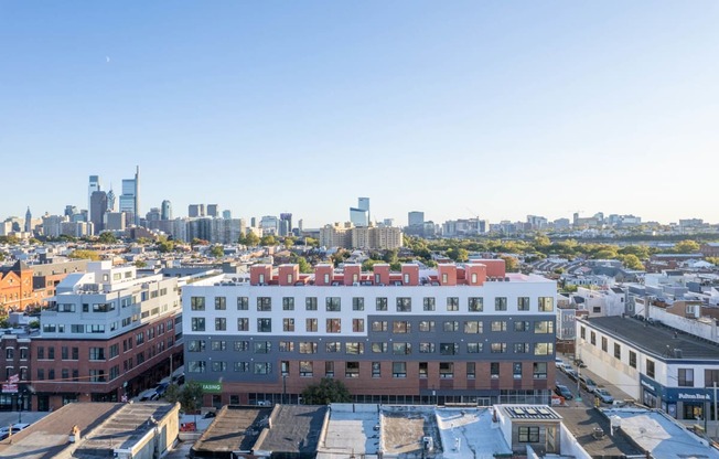 a view of the city from the roof of a building