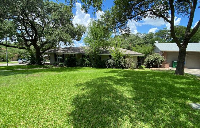 July Move-In Special - Fabulous 4/2 single story on large corner lot ~ great location!