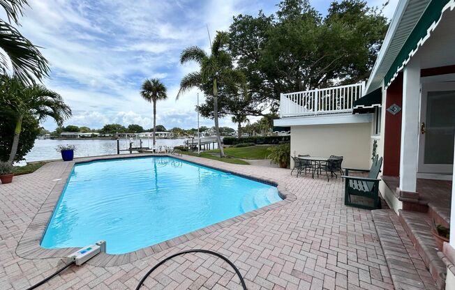 Classic waterfront Snell Isle Estates 3 Bed 2.5 Bath Home with private dock!