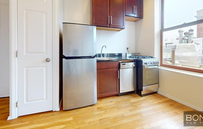 207-209 West 11th St.