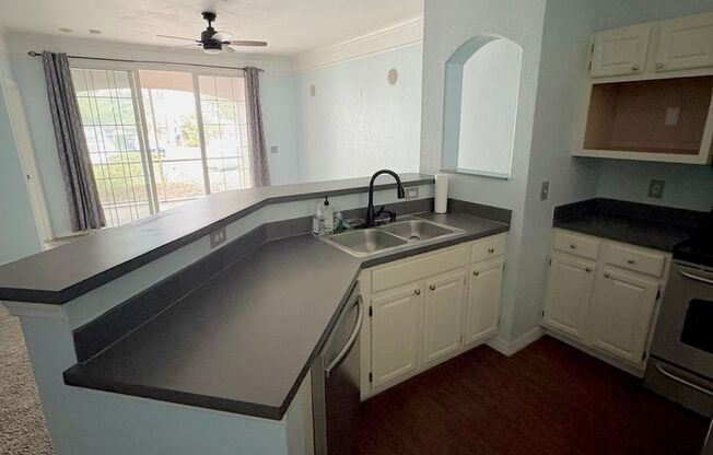 AVAILABLE NOW: First-floor 2-bedroom, 1-bath condo in Gated Community