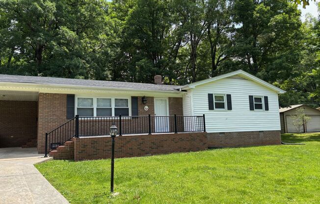 Nice brick home, single carport, storage building, 3 bdrm 1.5 ba
