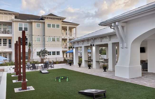 a view of the courtyard at the enclave at woodbridge apartments in sugar land, tx