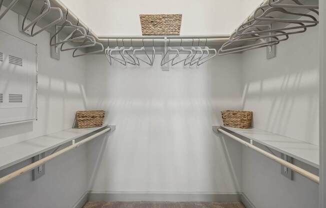 A white refrigerator with a basket on top of the door.