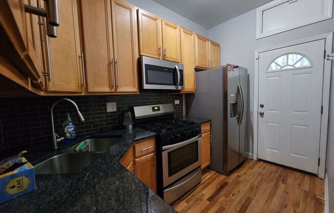 Across the street from UofC campus! Super spacious modern duplex down!