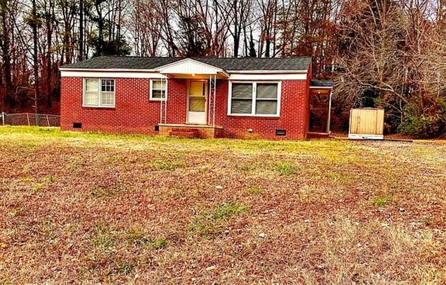 Newly renovated  3 bedroom 1 bath brick ranch home sitting on a large lot and on a quiet street in Gastonia