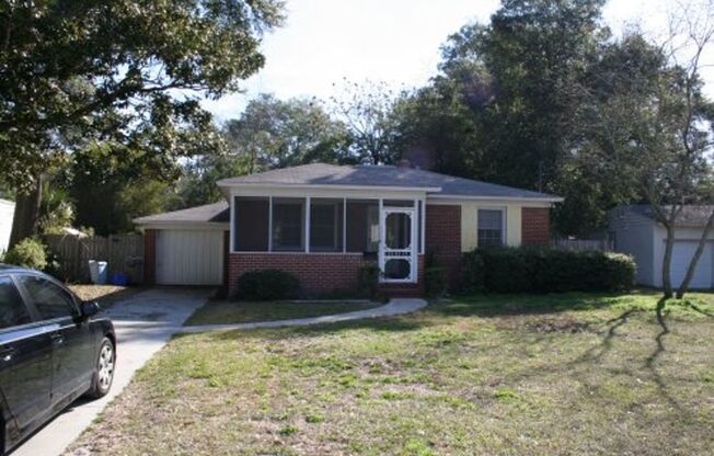 Cute  2 bedroom 1 bath Brick Bungalow with 1 car detached garage.