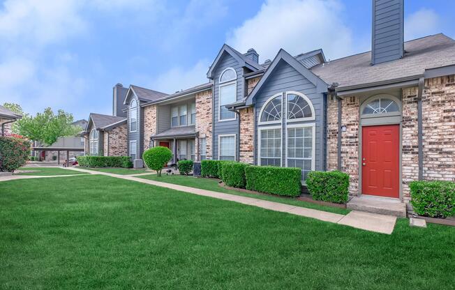 a large lawn in front of a house