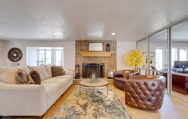 A classic living room in the clubhouse interior, featuring timeless furniture, comfortable seating arrangements, and tasteful decor, provides a welcoming and cozy communal space for residents to relax and socialize.