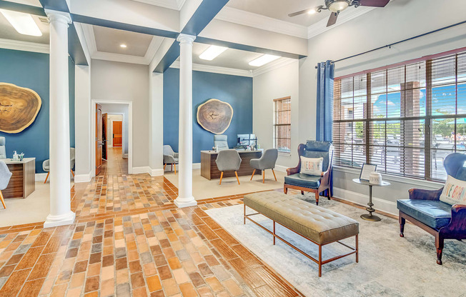 a living room with blue walls and a table with chairs