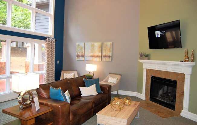 Living Area With Fireplace at The Pointe at Irving Park, Greensboro, NC