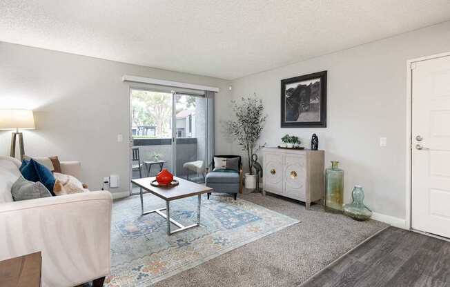 a living room with a couch and a table