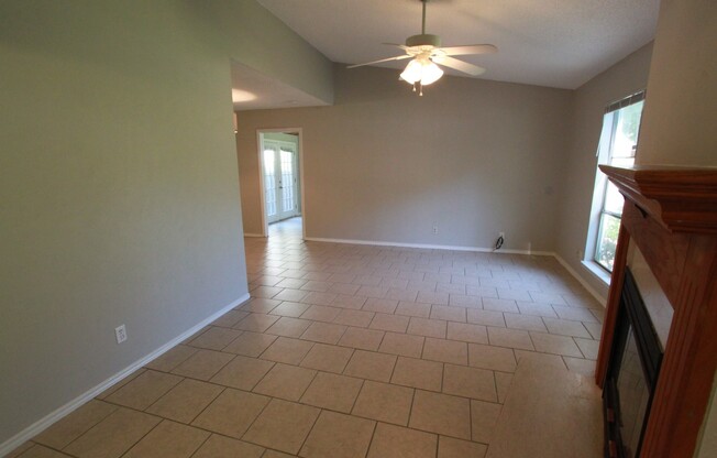 Southeast Austin Home with Vaulted Ceilings, Bonus Room & Private Backyard