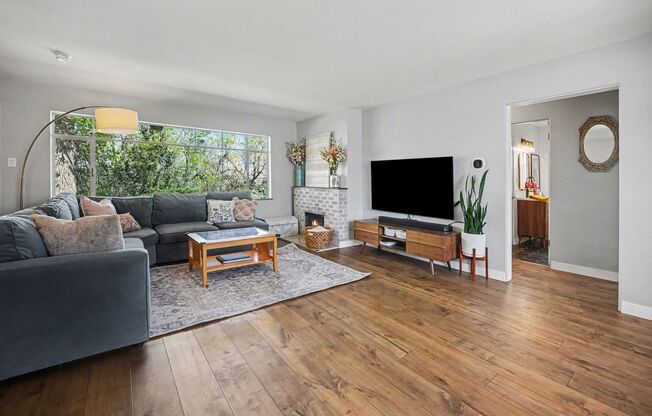 Sunlit Wheat Ridge Gem with Huge Wooded Backyard