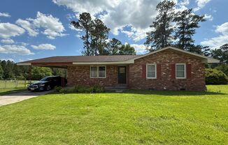 Charming 3 Bedroom, 2 Bath Home with Fenced Backyard and Garden Oasis