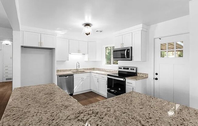 Renovated 4-Bedroom, 3-Bathroom Home in Millcreek