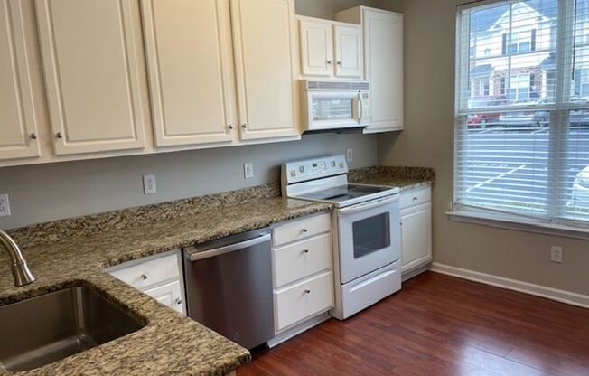 Must See Townhouse! Tons of Living Space! Community Pool & Clubhouse!