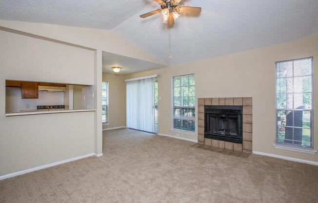 a living room filled with furniture and a flat screen tv