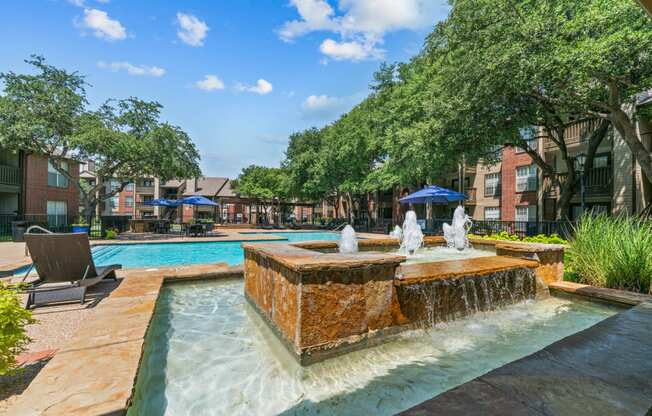 a fountain in front of a building