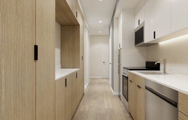 A modern kitchen with wooden cabinets and stainless steel appliances.