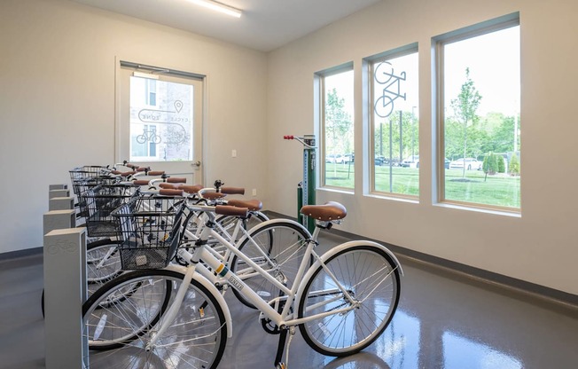 a row of bikes parked in a room at The Clearing at ONE28, Kansas