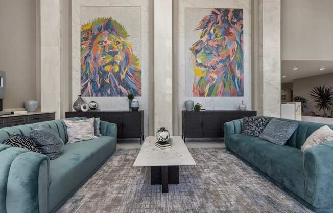 a living room filled with furniture and a large painting of a lion