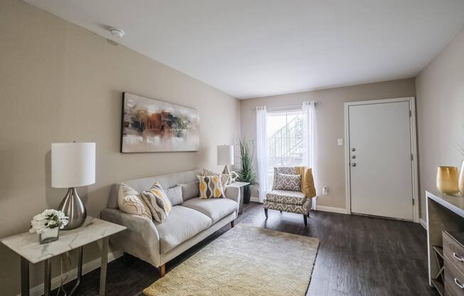 a bedroom with a view of a living room