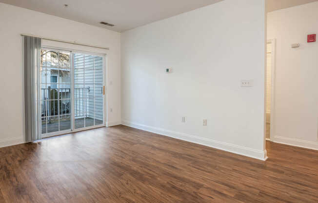 Living Room with Balcony and Hard Surface Flooring