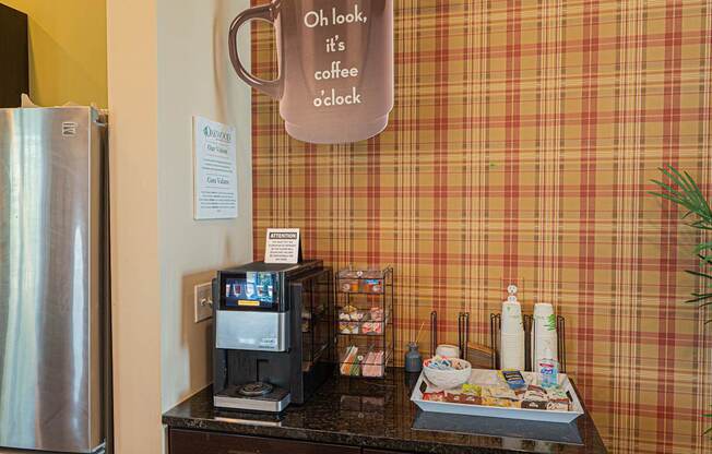 a coffee shop with a coffee cup on the wall
