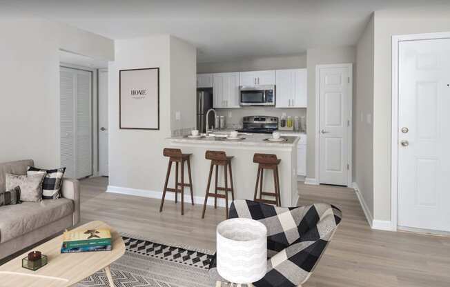 a kitchen and living room in a 555 waverly unit