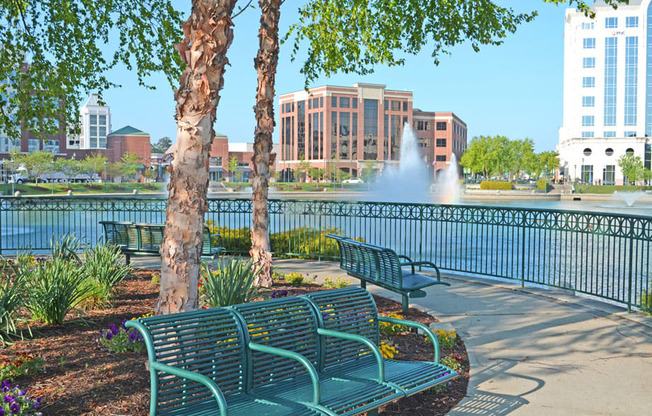 City Center benches overlooking fountain; office buildings and shops