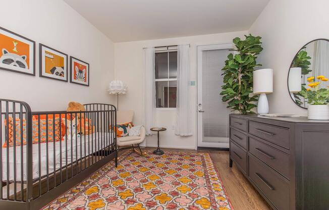 a bedroom with a bed in a room
