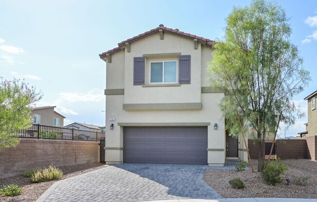 NW!! Gated!! Built 2023!!!! Corner Lot!! Low Maintenance Desert Landscape Front!! Patio & Synthetic Grass in Back!! Pet Friendly!!