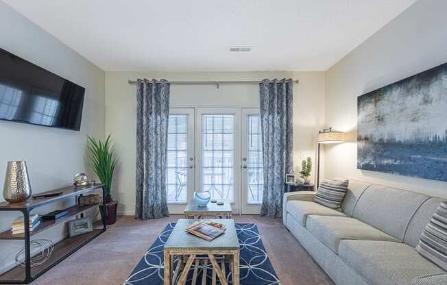 a living room with a couch and a coffee table