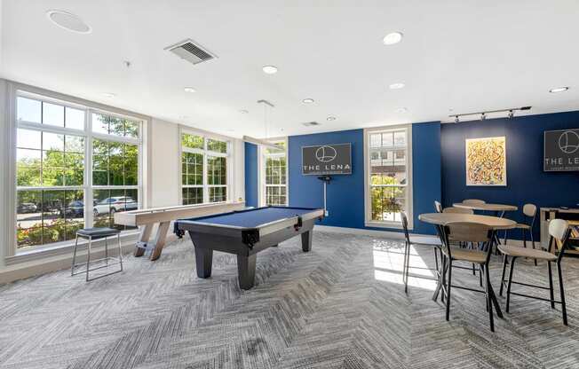 a recreation room with a pool table and a ping pong table  at The Lena, Raritan