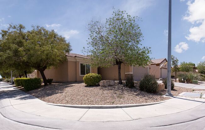 Single story Sun City Aliante home with views of the golf course