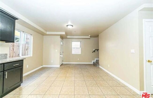 10605 S AVALON BLVD