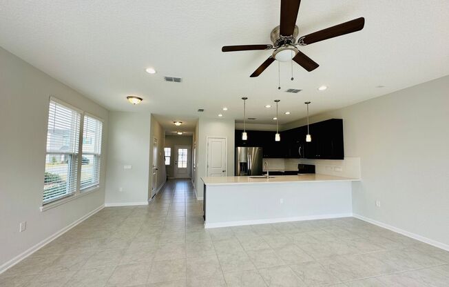 Spacious 3 Bed 2 Bath End Unit Townhome with Garage & Loft. Community features & High End Amenities! Pet Friendly! Washer / Dryer Included