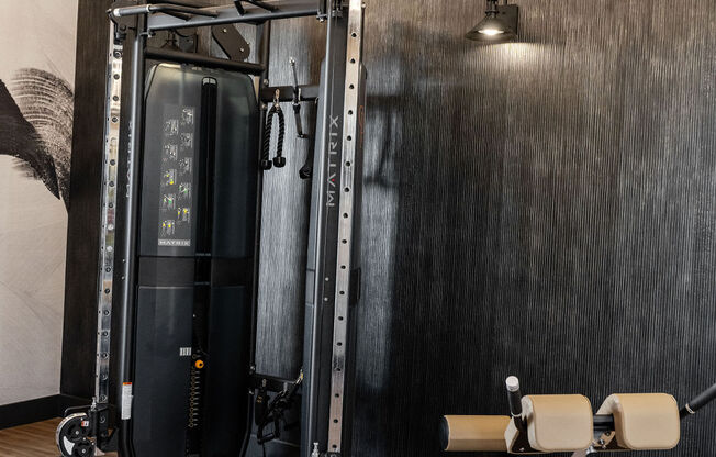 A gym with a wooden floor and a wall-mounted fan at Madison Prickett Preserve, Pennsylvania