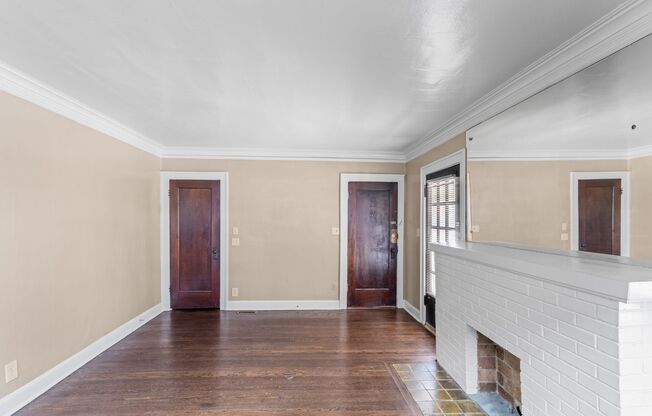 Charming 2-Bed Home with Hardwood Floors & Bright, Open Living Spaces!