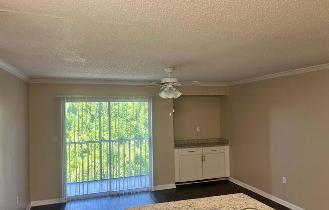 a bedroom with a large window