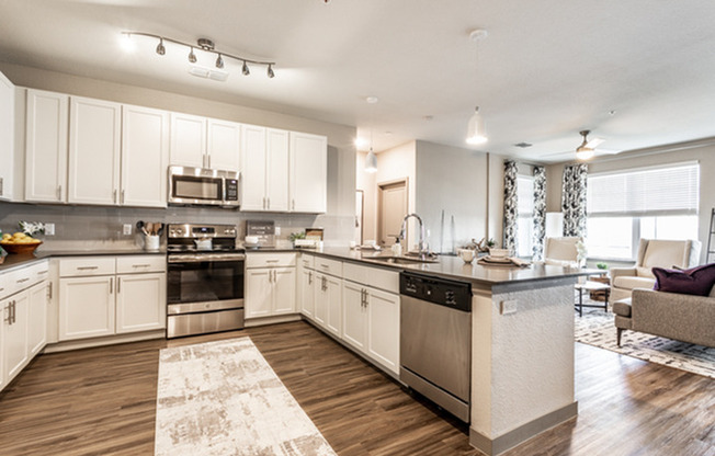 furnished living area with breakfast bar in apartment home