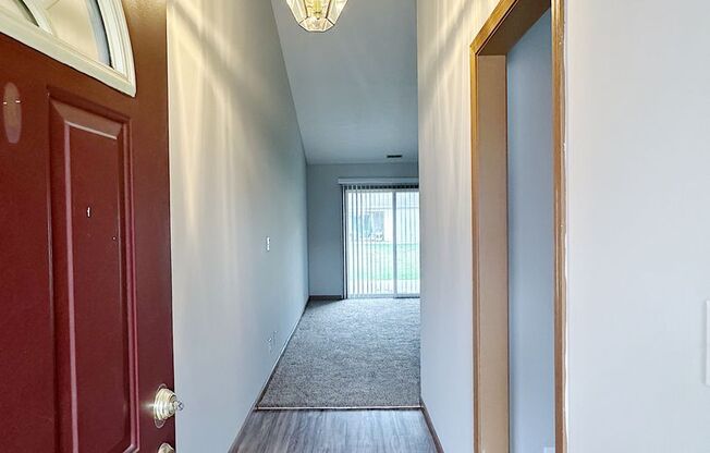 Spacious 2BD 2BA duplex with 2 car attached garage. Just a few steps away from everything you need!