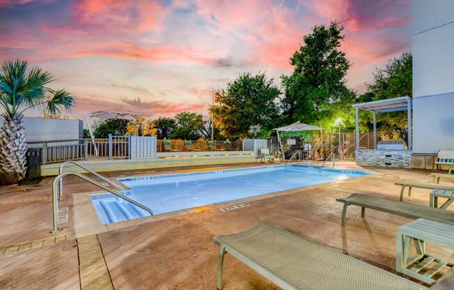 Enjoy the pool from sun up to sun down with Wi-Fi access at  Windsor on the Lake, 43 Rainey Street, Austin, TX