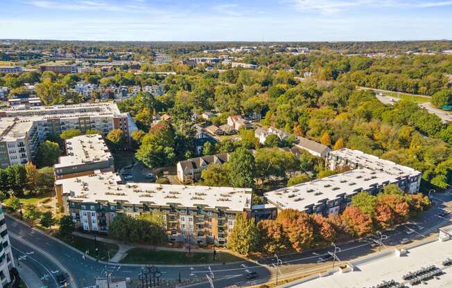 Flatiron West Trade Apartments aerial view with Charlotte skyline in background
