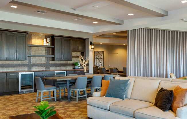 a living room with a couch and a table at The Rays at Vegas Towers Apartments, Las Vegas, 89119